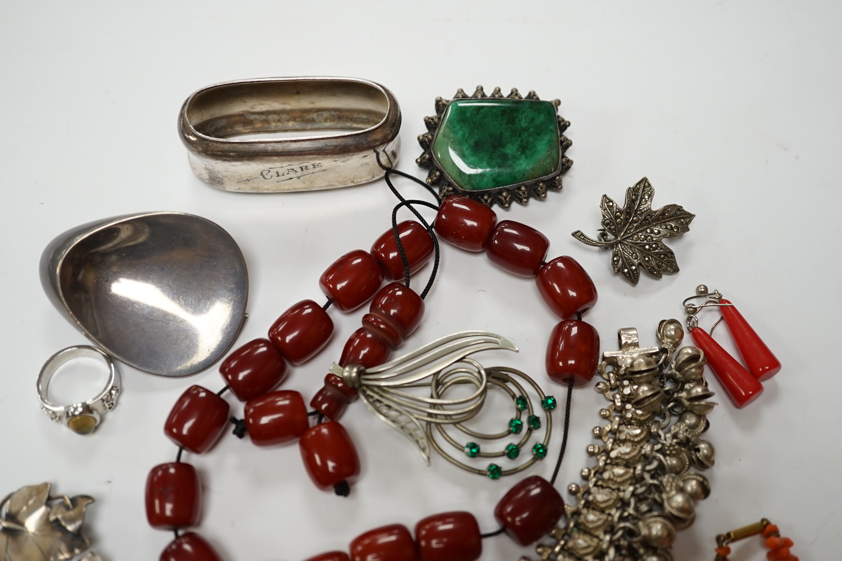 A quantity of assorted jewellery including costume, a pair of Danish sterling ear clips, a 1960's Nanna & Jorgen Ditzel for Georg Jensen sterling silver brooch, no.328, 51mm, a pair of Georg Jensen sterling ear clips, no